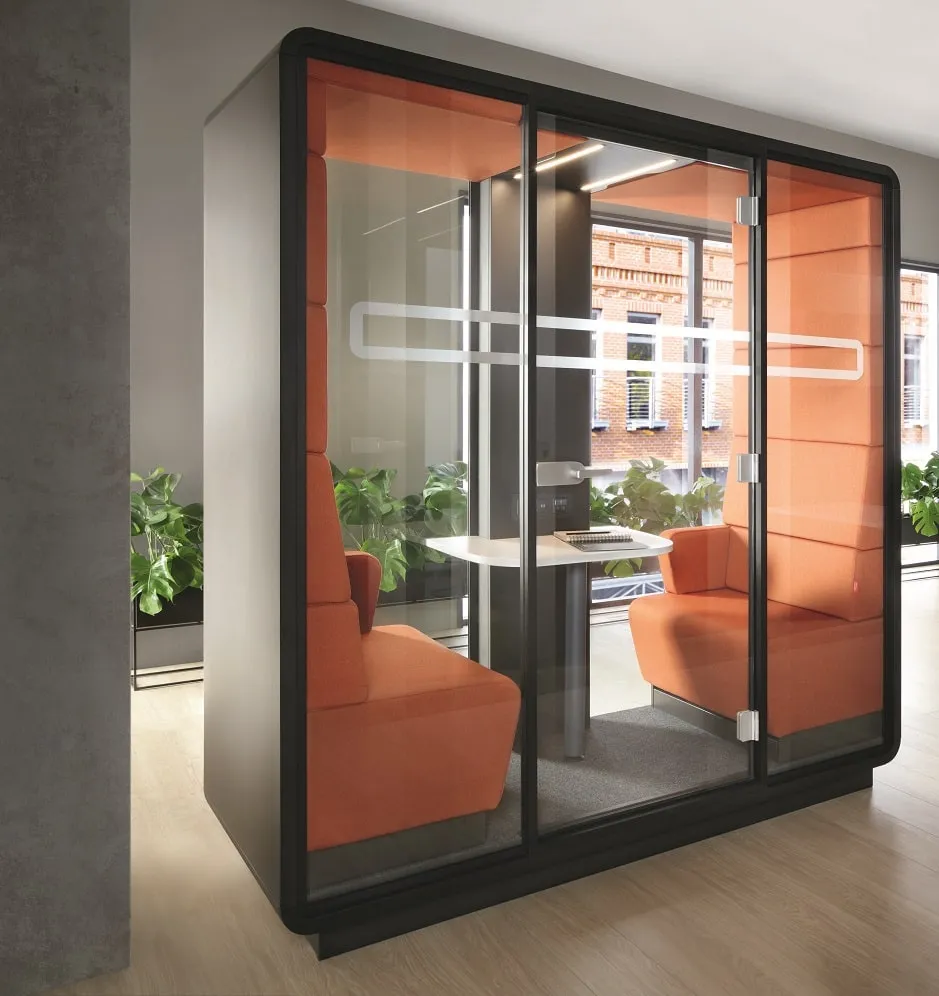 Friendly office reception area with shared seating and natural daylight